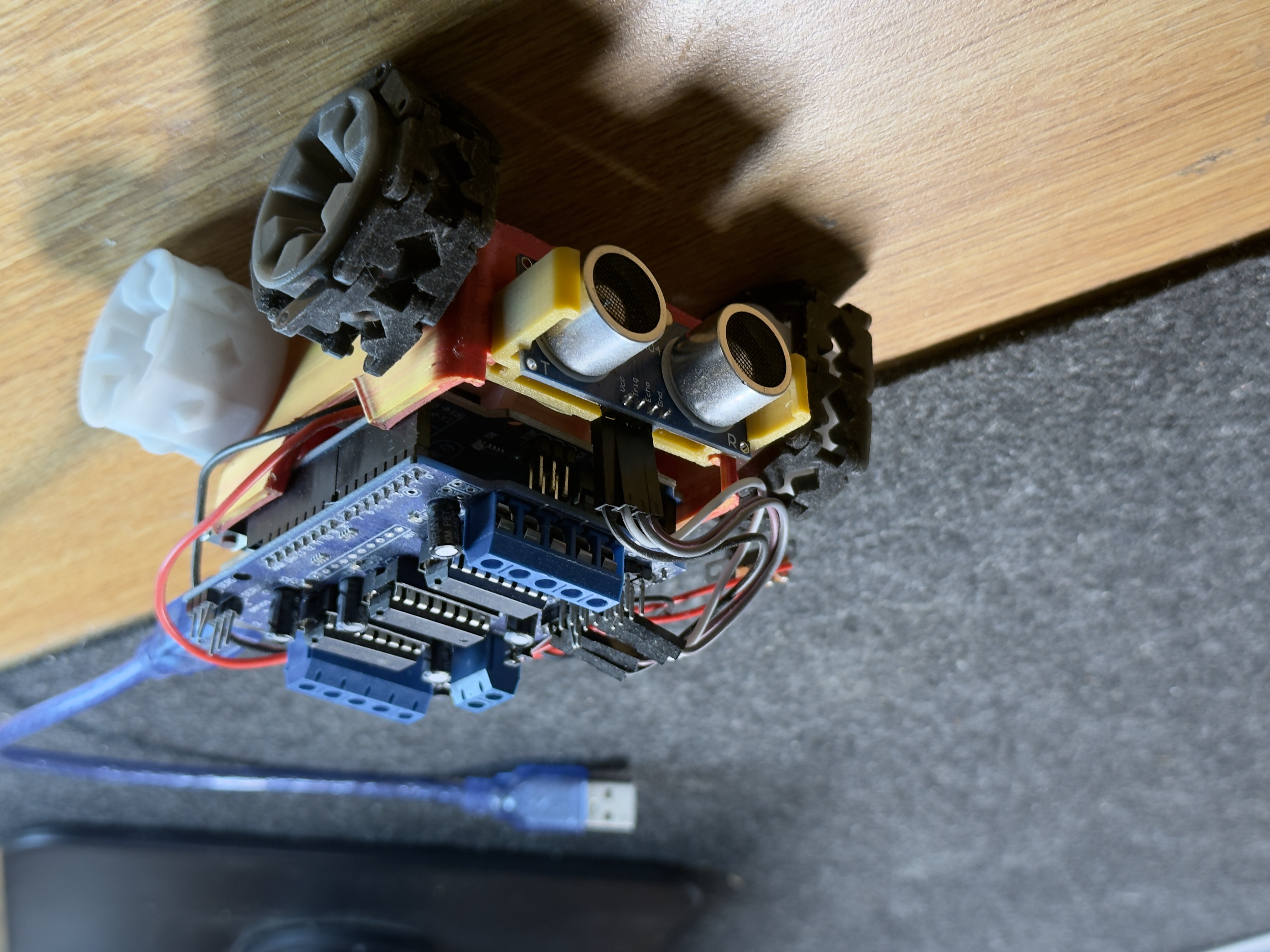 Assembled Arduino obstacle avoidance vehicle with ultrasonic sensor mounted