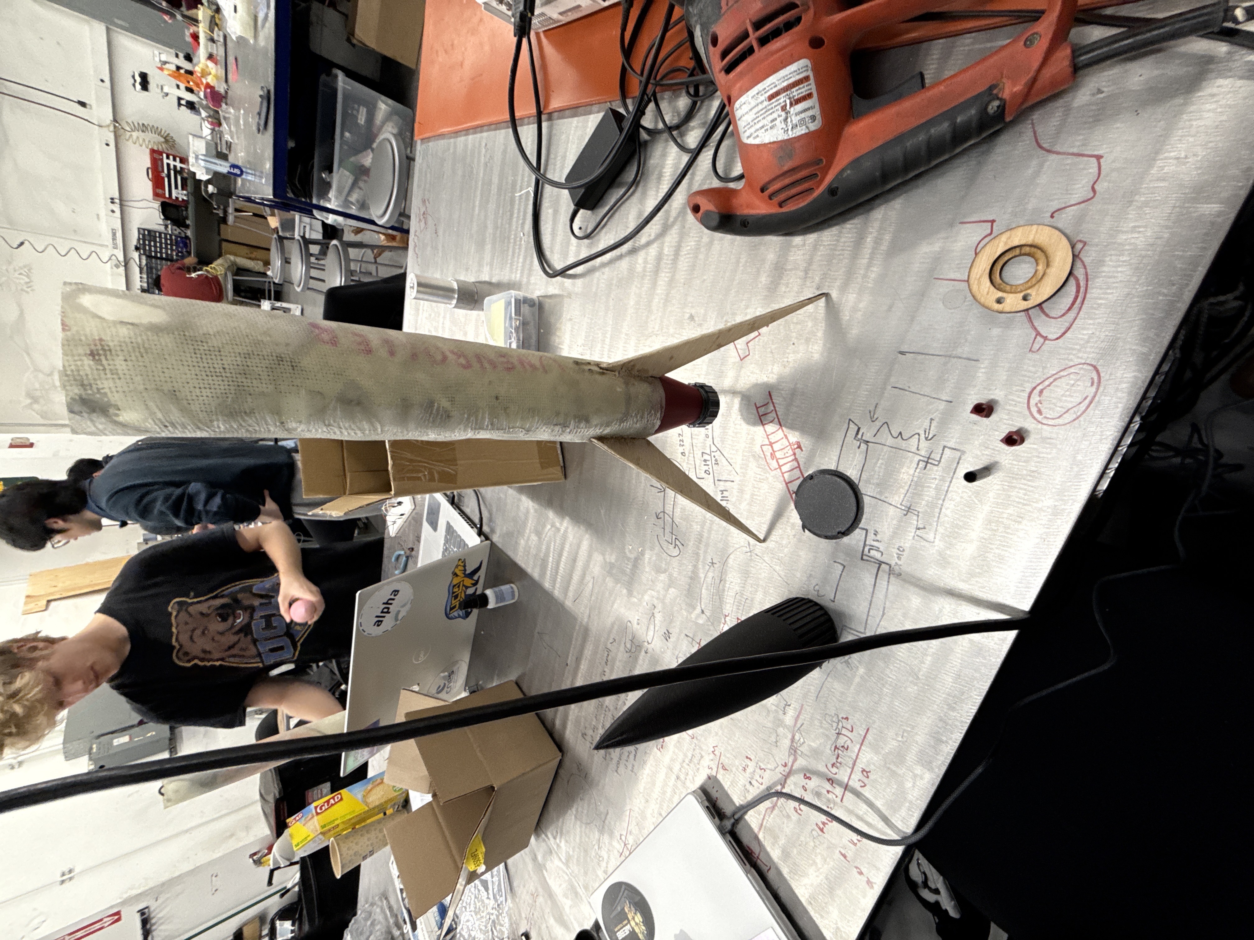 Fiberglass body tube wet layup in progress